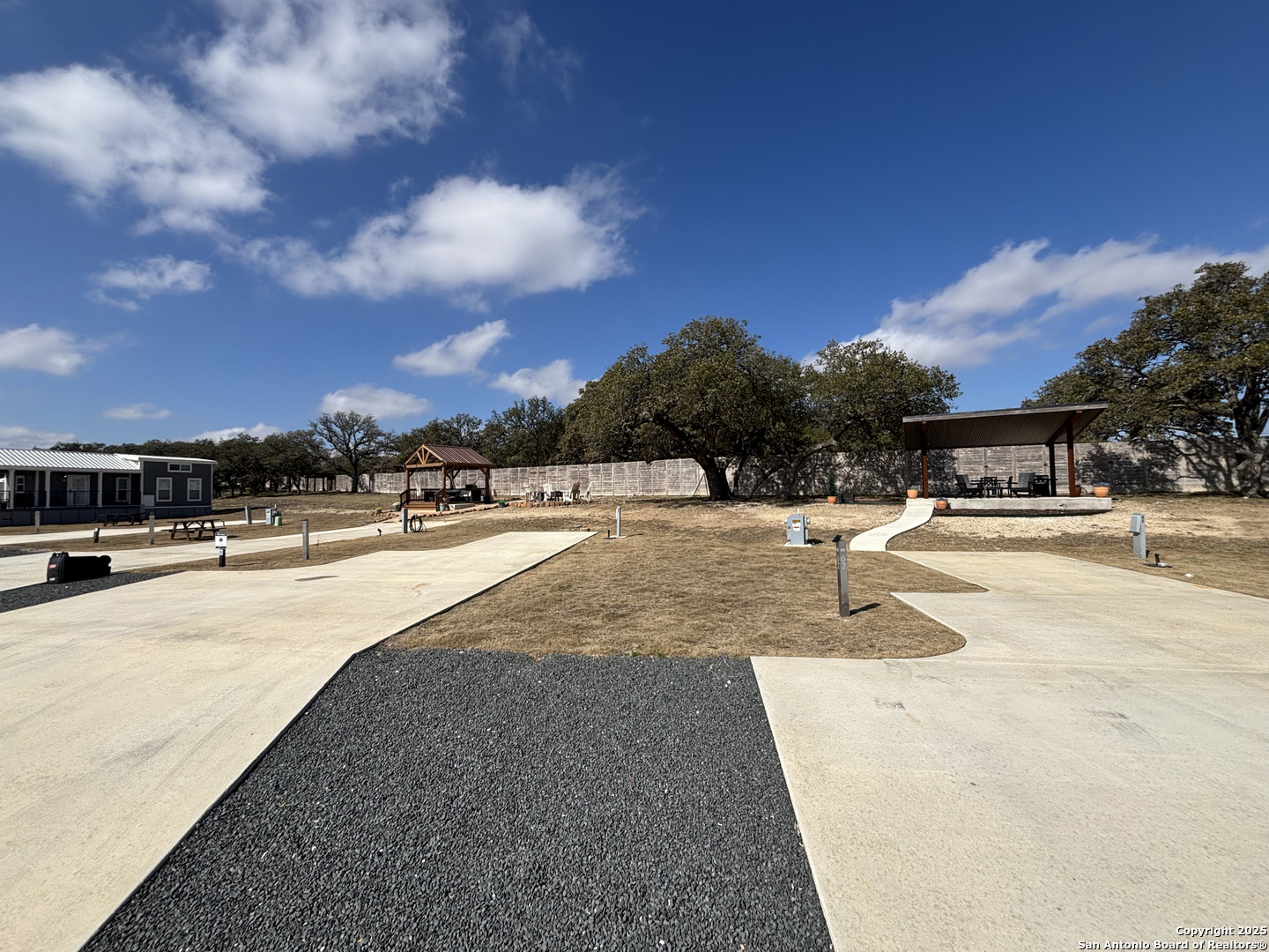 5386 Ranch Road 1376, Unit 63 Fredericksburg, TX 78624 - Photo 4 of 31 a view of swimming pool with outdoor seating