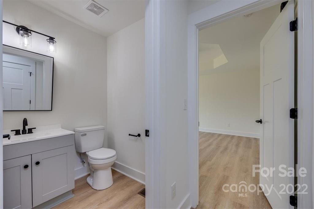 1009 Rainbow Circle Catawba, SC 29704 - Photo 12 of 21 a bathroom with a toilet sink and mirror