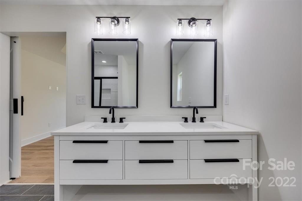 1009 Rainbow Circle Catawba, SC 29704 - Photo 16 of 21 a bathroom with double vanity sinks and a mirror