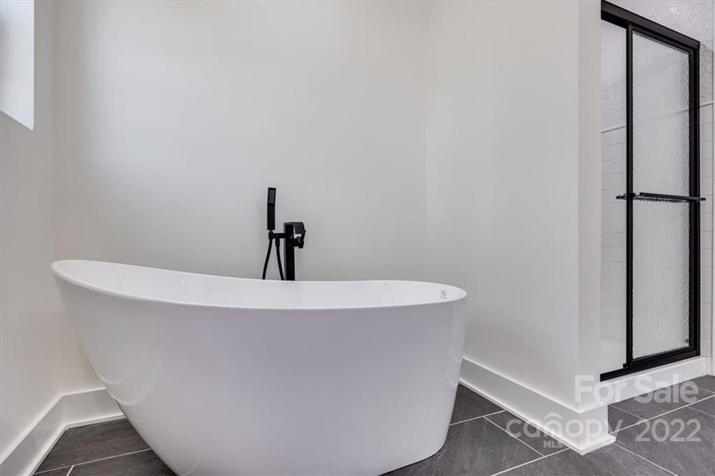 1009 Rainbow Circle Catawba, SC 29704 - Photo 17 of 21 a white bath tub sitting in a bathroom