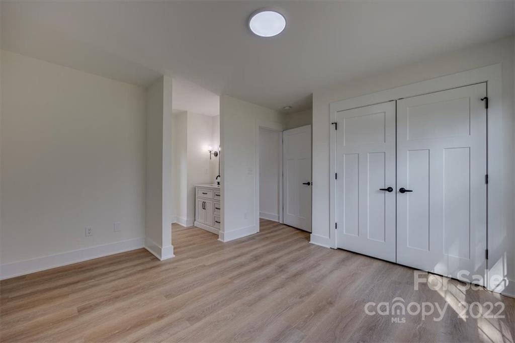 1009 Rainbow Circle Catawba, SC 29704 - Photo 8 of 21 a view of an empty room with wooden floor