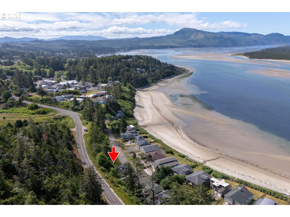 Happy Camp Road Tillamook, OR 97141 - Photo 7 of 14 a view of a city from a lake