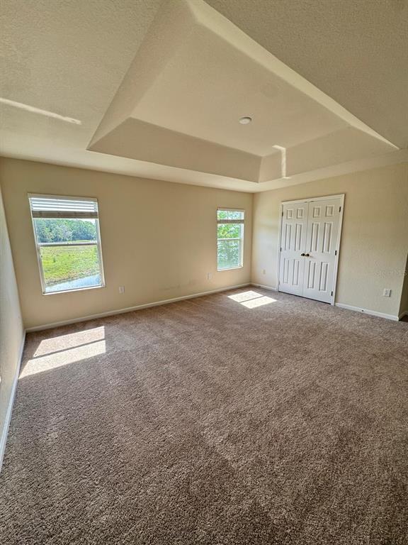 2543 Old Kent Circle Kissimmee, FL 34758 - Photo 11 of 41 an empty room with a empty space and windows