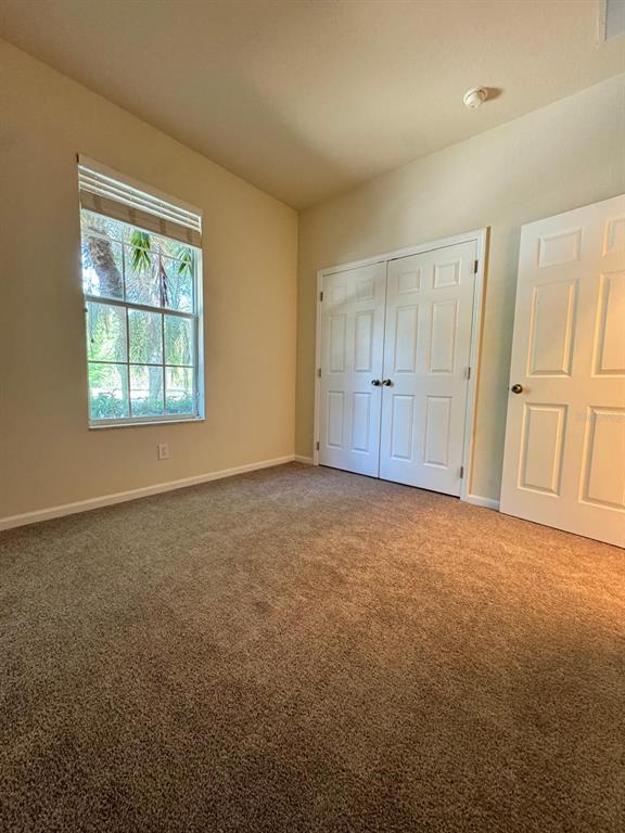 2543 Old Kent Circle Kissimmee, FL 34758 - Photo 15 of 41 an empty room with a natural light
