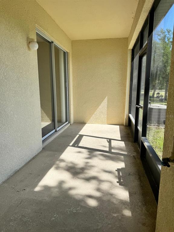 2543 Old Kent Circle Kissimmee, FL 34758 - Photo 22 of 41 a view of a living room with a large window