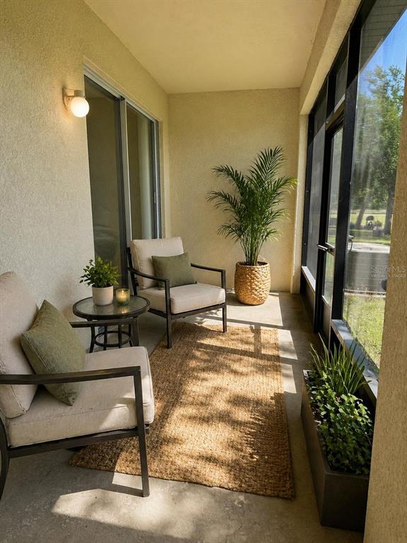 2543 Old Kent Circle Kissimmee, FL 34758 - Photo 23 of 41 a living room with furniture and a potted plant