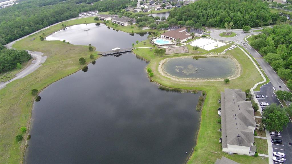 2543 Old Kent Circle Kissimmee, FL 34758 - Photo 25 of 41 an aerial view of a house with outdoor space and a lake view