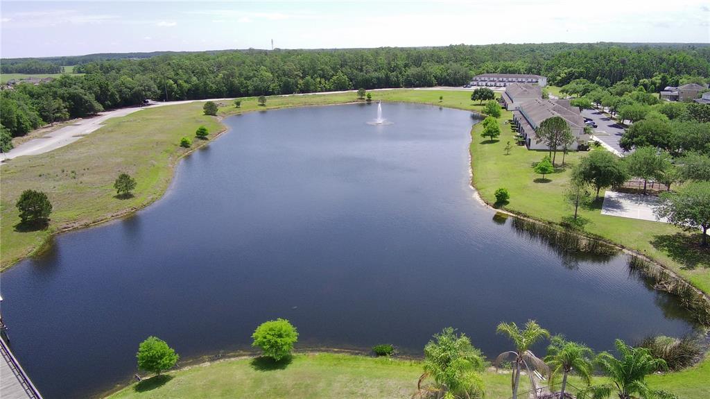 2543 Old Kent Circle Kissimmee, FL 34758 - Photo 28 of 41 a view of a lake with a outdoor space