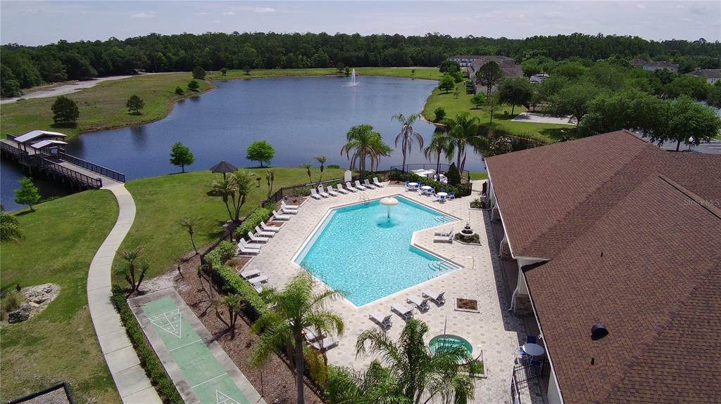 2543 Old Kent Circle Kissimmee, FL 34758 - Photo 30 of 41 an aerial view of a house with a swimming pool and outdoor seating