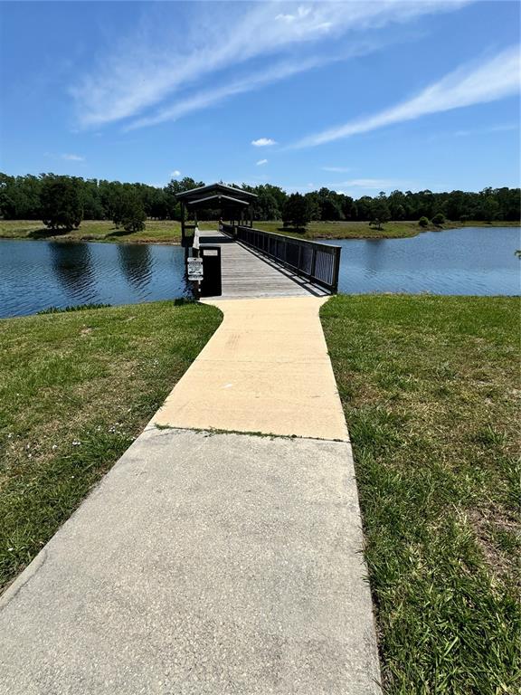 2543 Old Kent Circle Kissimmee, FL 34758 - Photo 37 of 41 a view of a lake with a mountain
