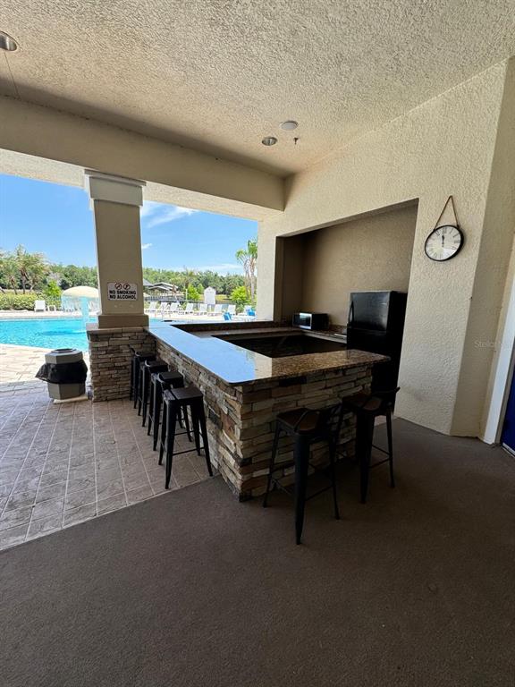 2543 Old Kent Circle Kissimmee, FL 34758 - Photo 41 of 41 a view of a livingroom with furniture and window