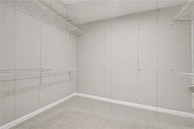a view of an empty walk in closet