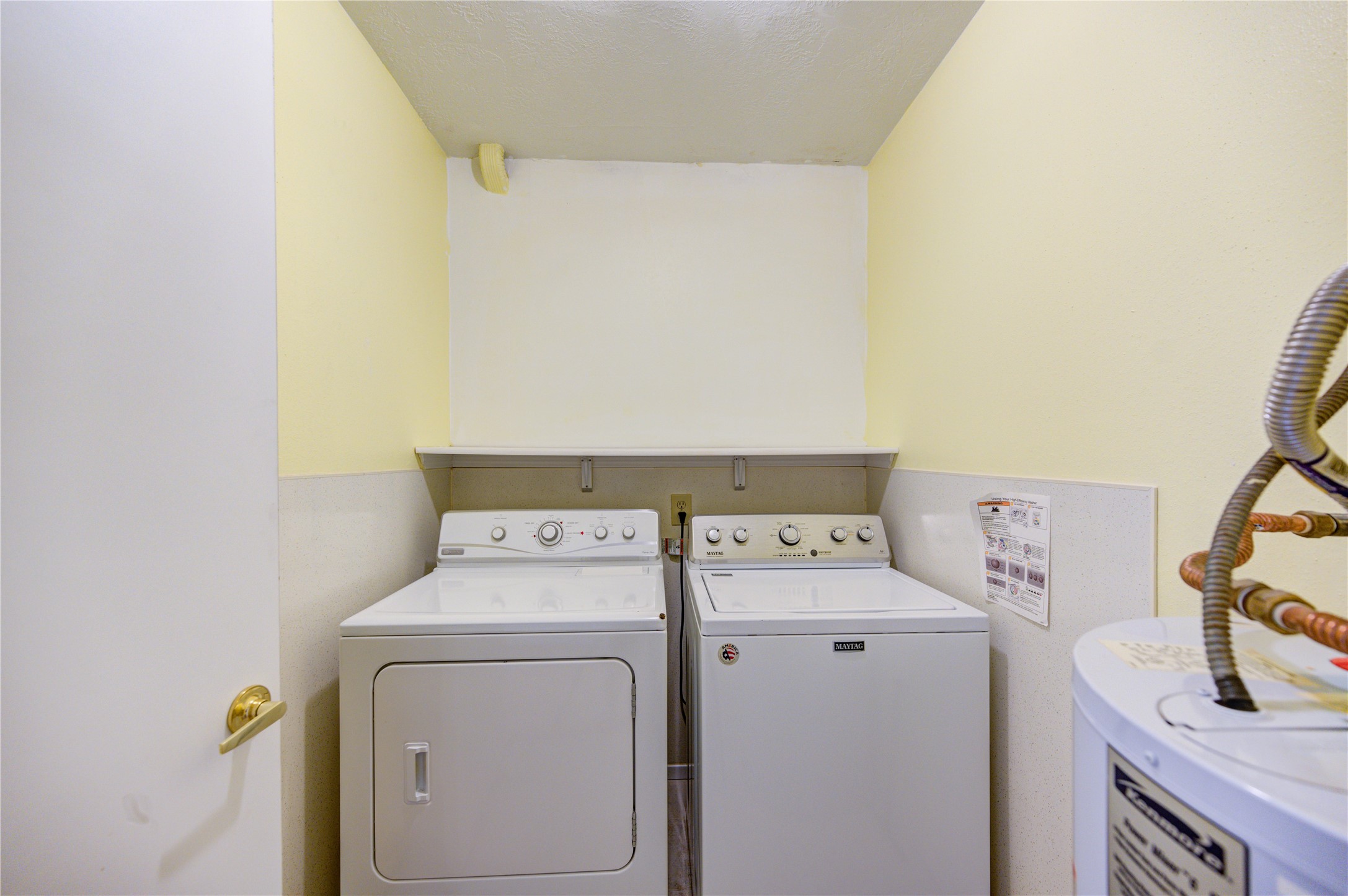 10823 Radford Lane Houston, TX 77031 - Photo 11 of 18 a utility room with dryer and washer