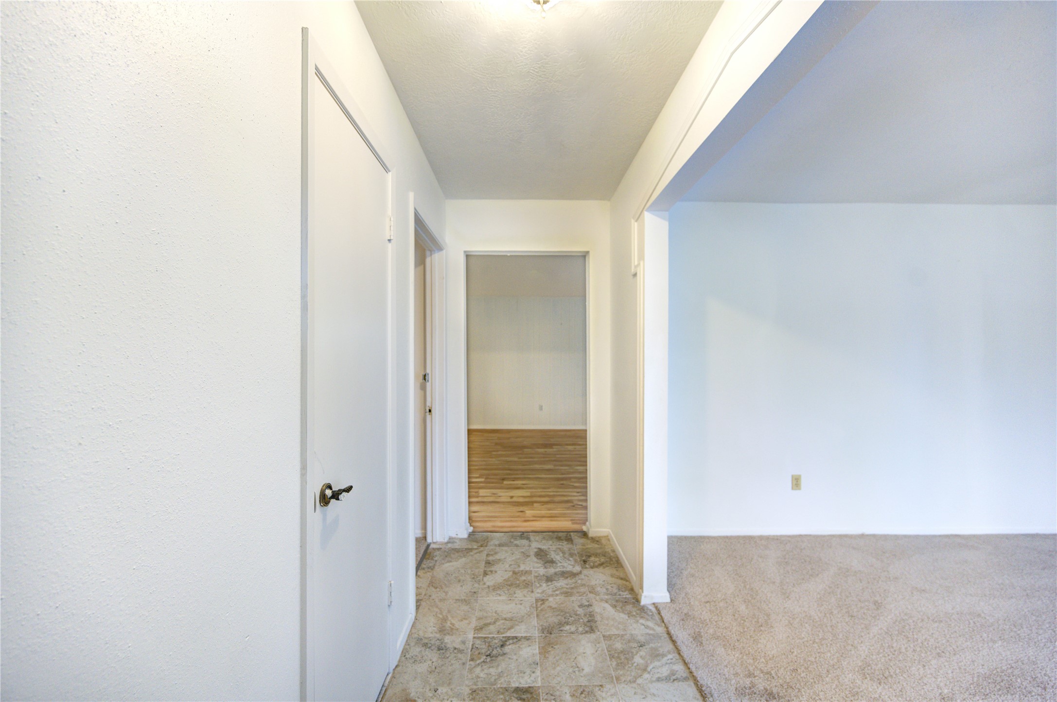 10823 Radford Lane Houston, TX 77031 - Photo 3 of 18 a view of hallway with wooden floor