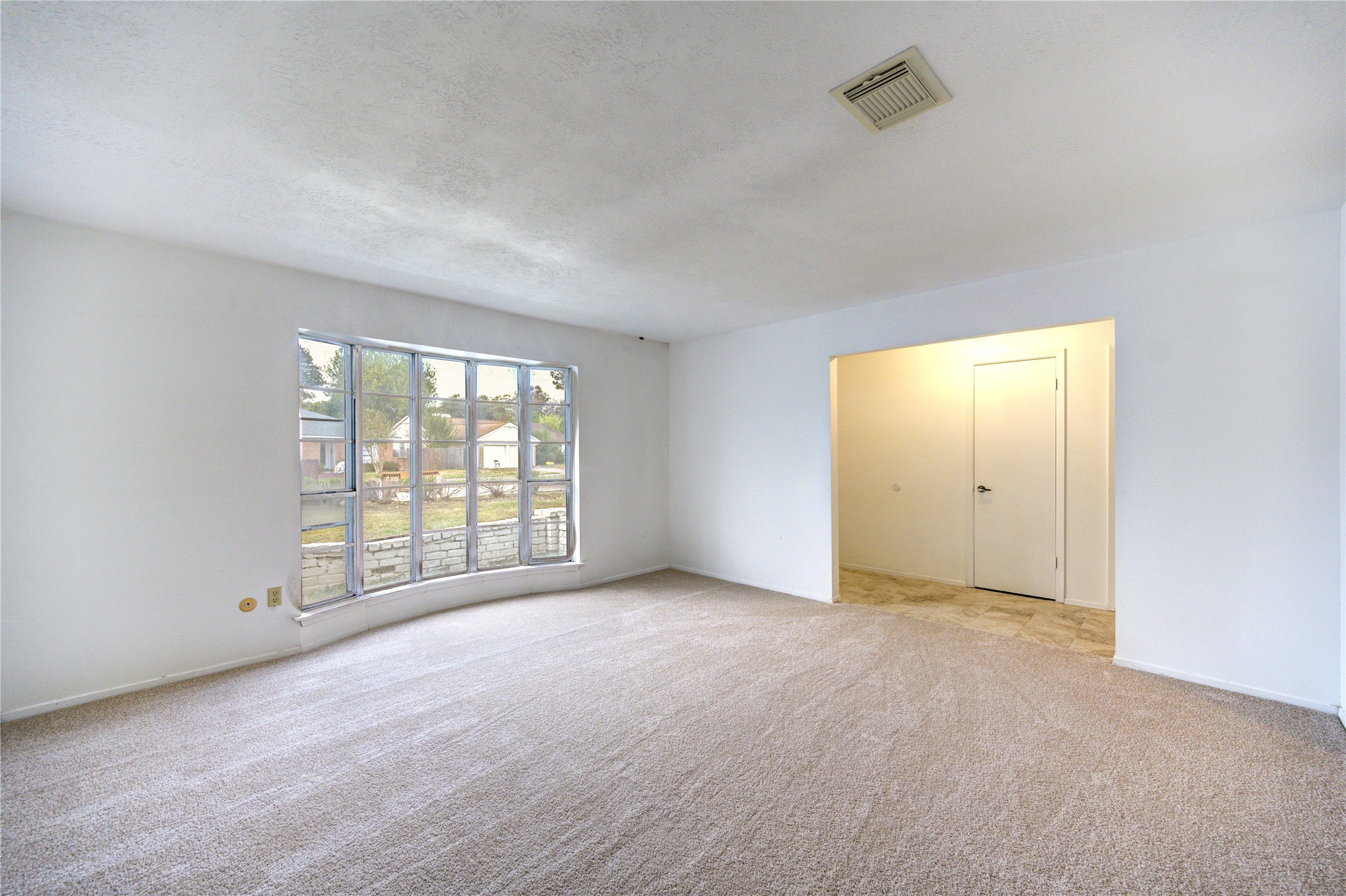 10823 Radford Lane Houston, TX 77031 - Photo 4 of 18 an empty room with windows