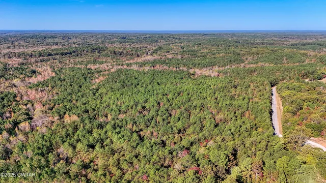 a view of a room with an outdoor space and seating area