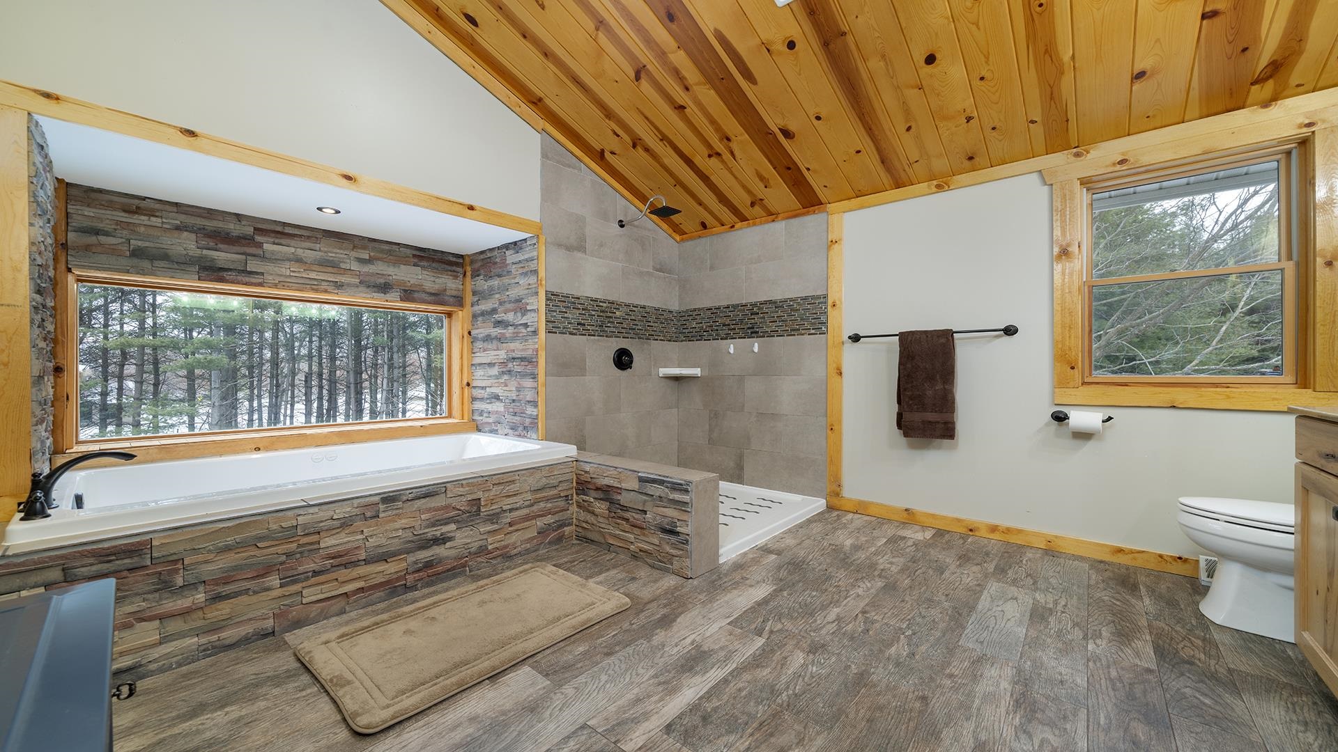 2063 Grand Detour Road Dixon, IL 61021 - Photo 14 of 44 a spacious bedroom with a large bed and a large window
