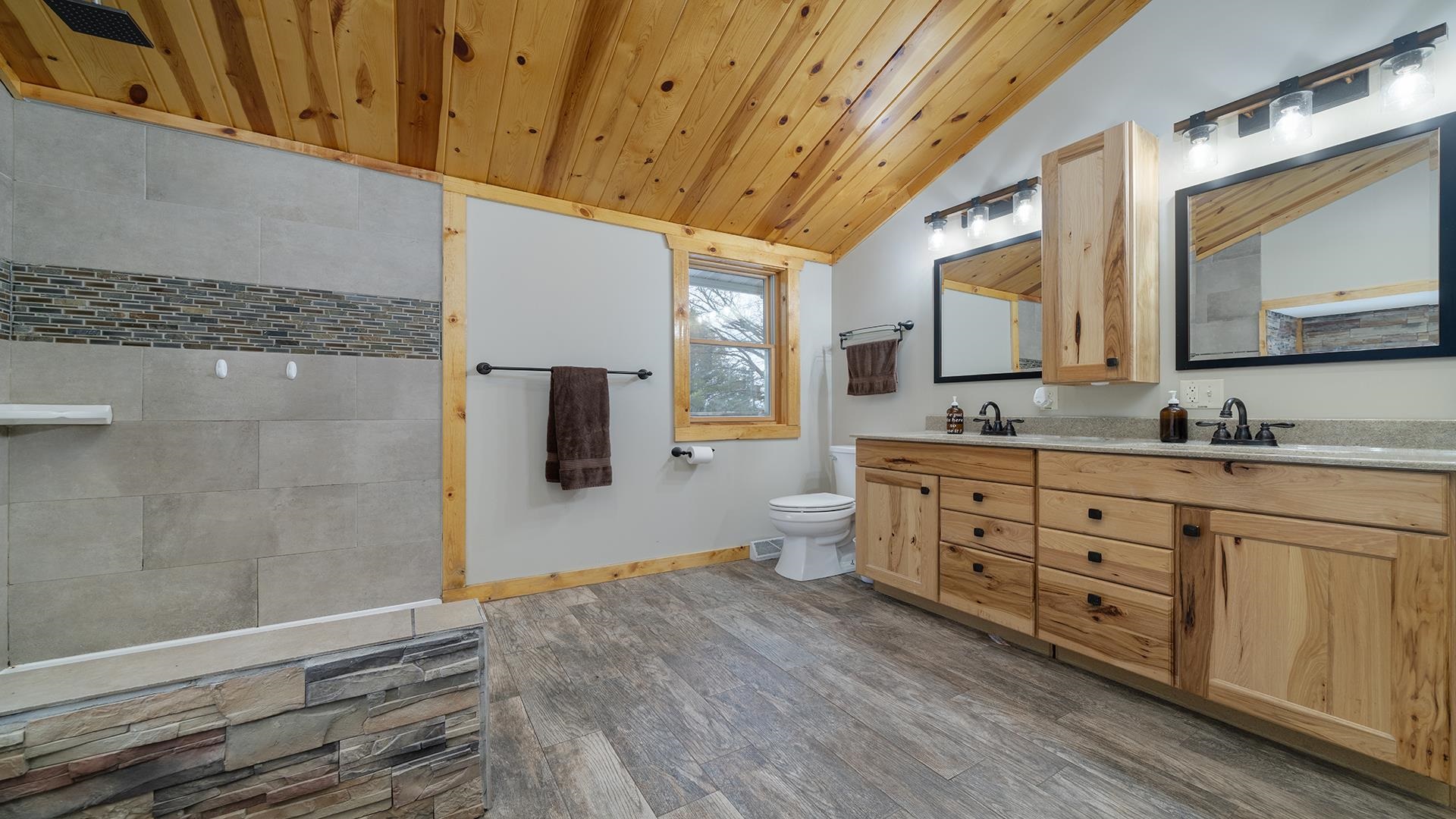 2063 Grand Detour Road Dixon, IL 61021 - Photo 18 of 44 a bathroom with a granite countertop double vanity sink and mirror