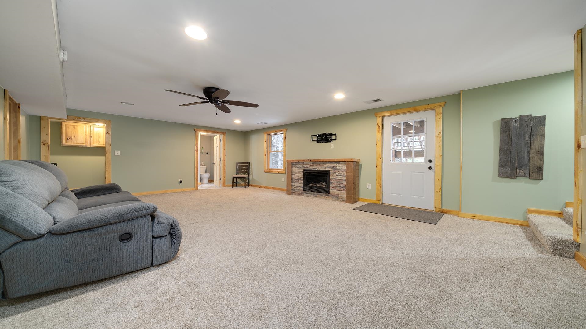 2063 Grand Detour Road Dixon, IL 61021 - Photo 22 of 44 a living room with furniture and a fireplace