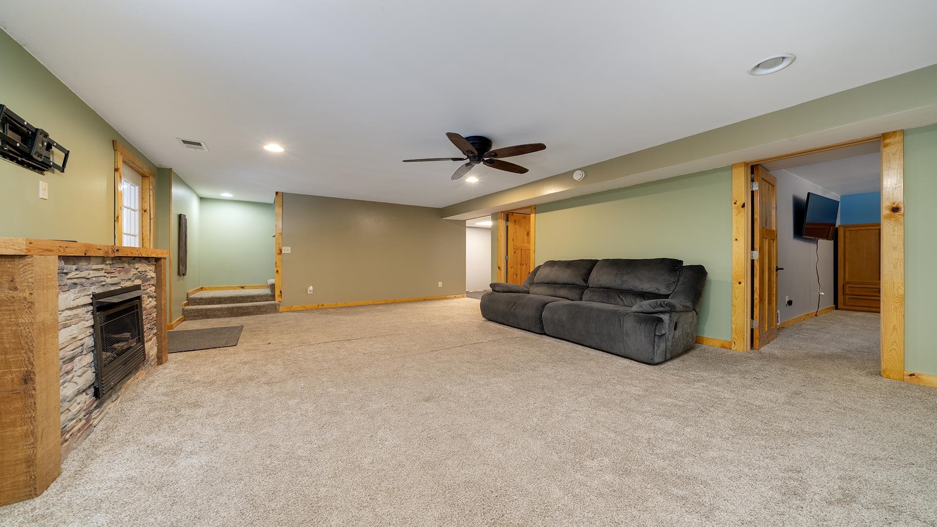 2063 Grand Detour Road Dixon, IL 61021 - Photo 23 of 44 a living room with furniture and a fireplace