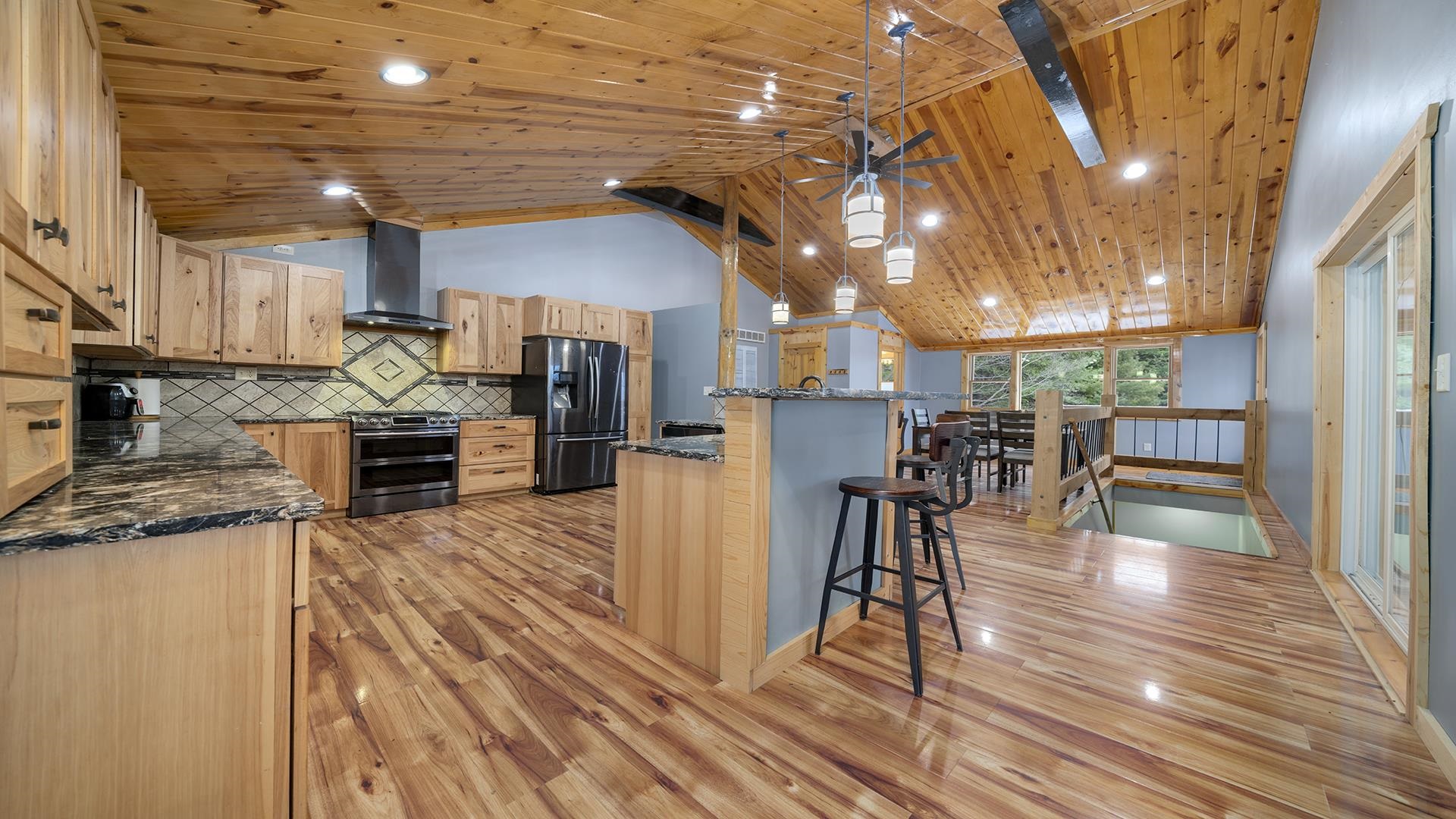2063 Grand Detour Road Dixon, IL 61021 - Photo 3 of 44 a view of a kitchen with dining table and wooden floor