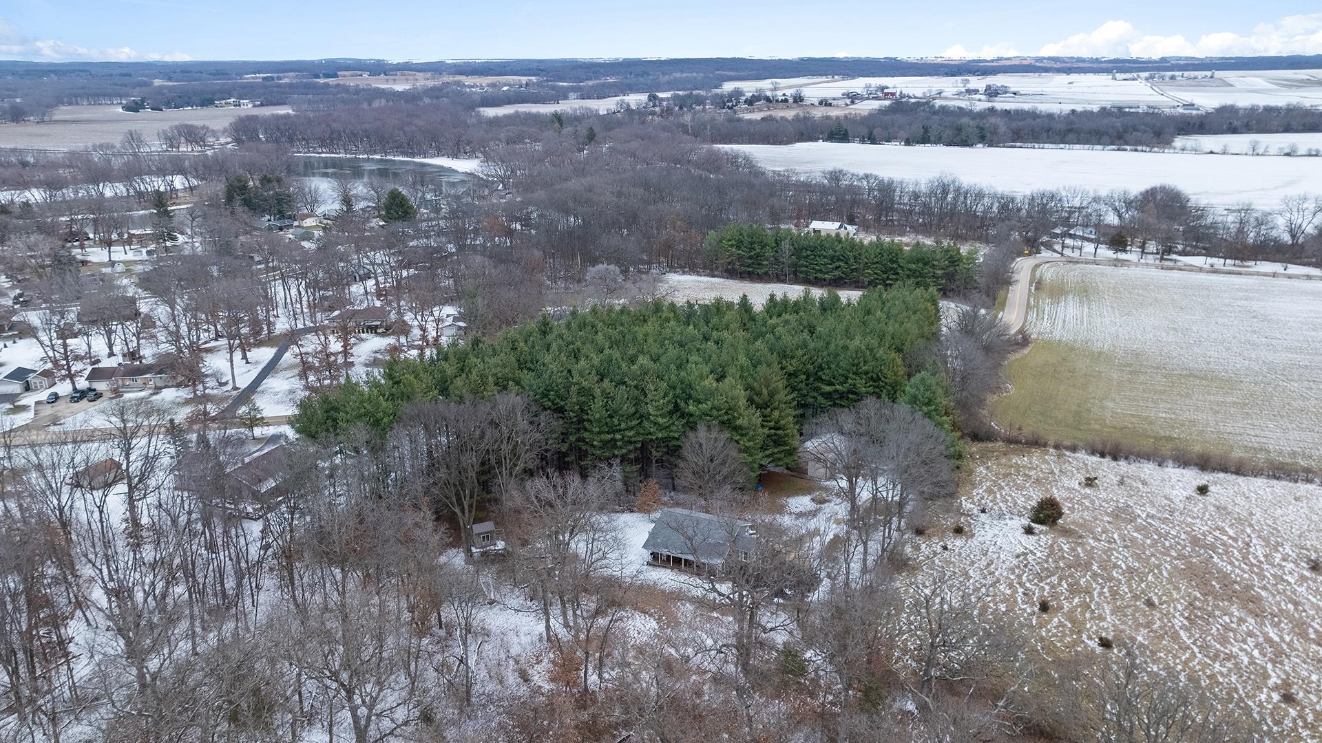 2063 Grand Detour Road Dixon, IL 61021 - Photo 39 of 44 a view of a lake with mountains in the background