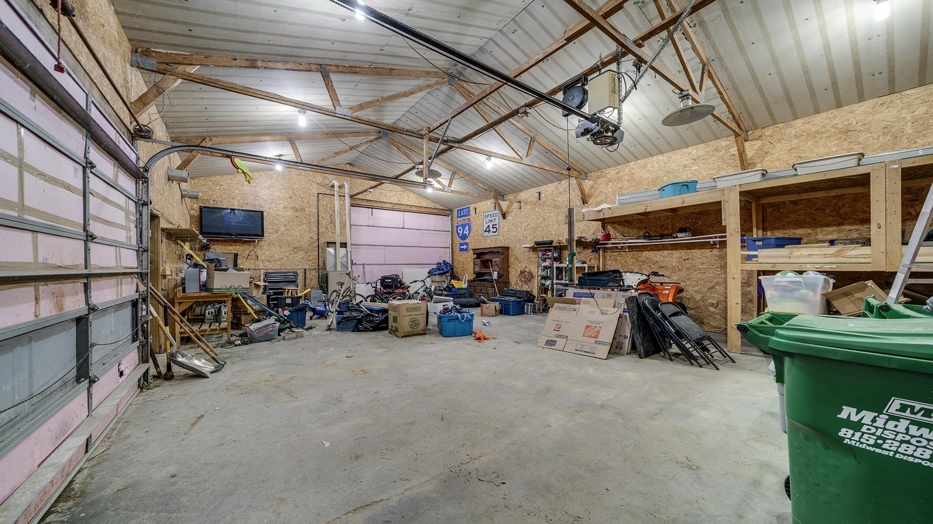 2063 Grand Detour Road Dixon, IL 61021 - Photo 41 of 44 a view of a garage with a bike and a car