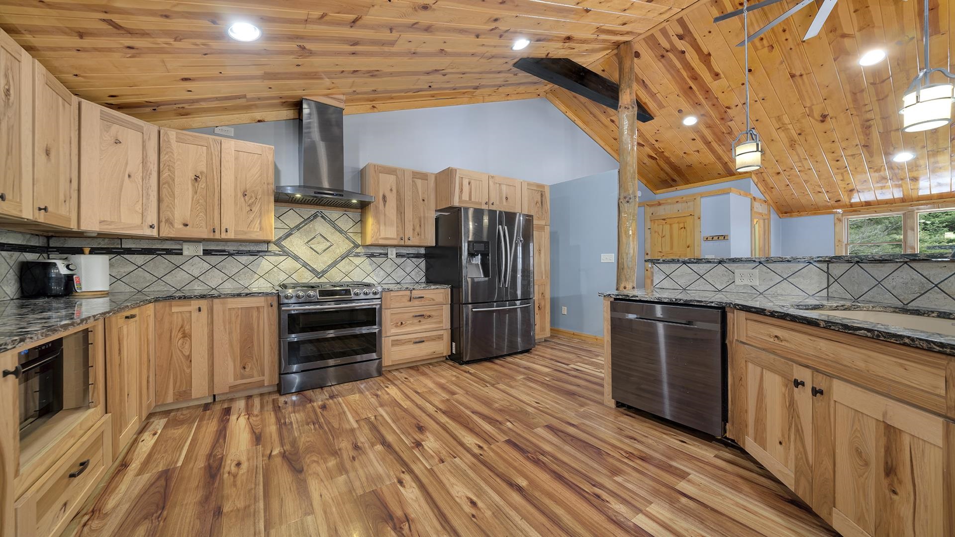 2063 Grand Detour Road Dixon, IL 61021 - Photo 9 of 44 a kitchen with stainless steel appliances granite countertop a stove and cabinets