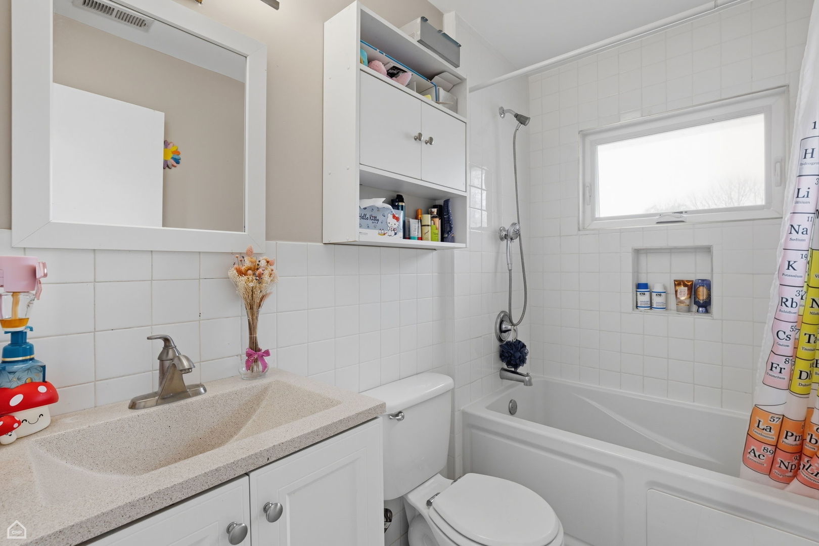 7301 Davis Street Morton Grove, IL 60053 - Photo 11 of 14 a bathroom with a sink toilet and shower