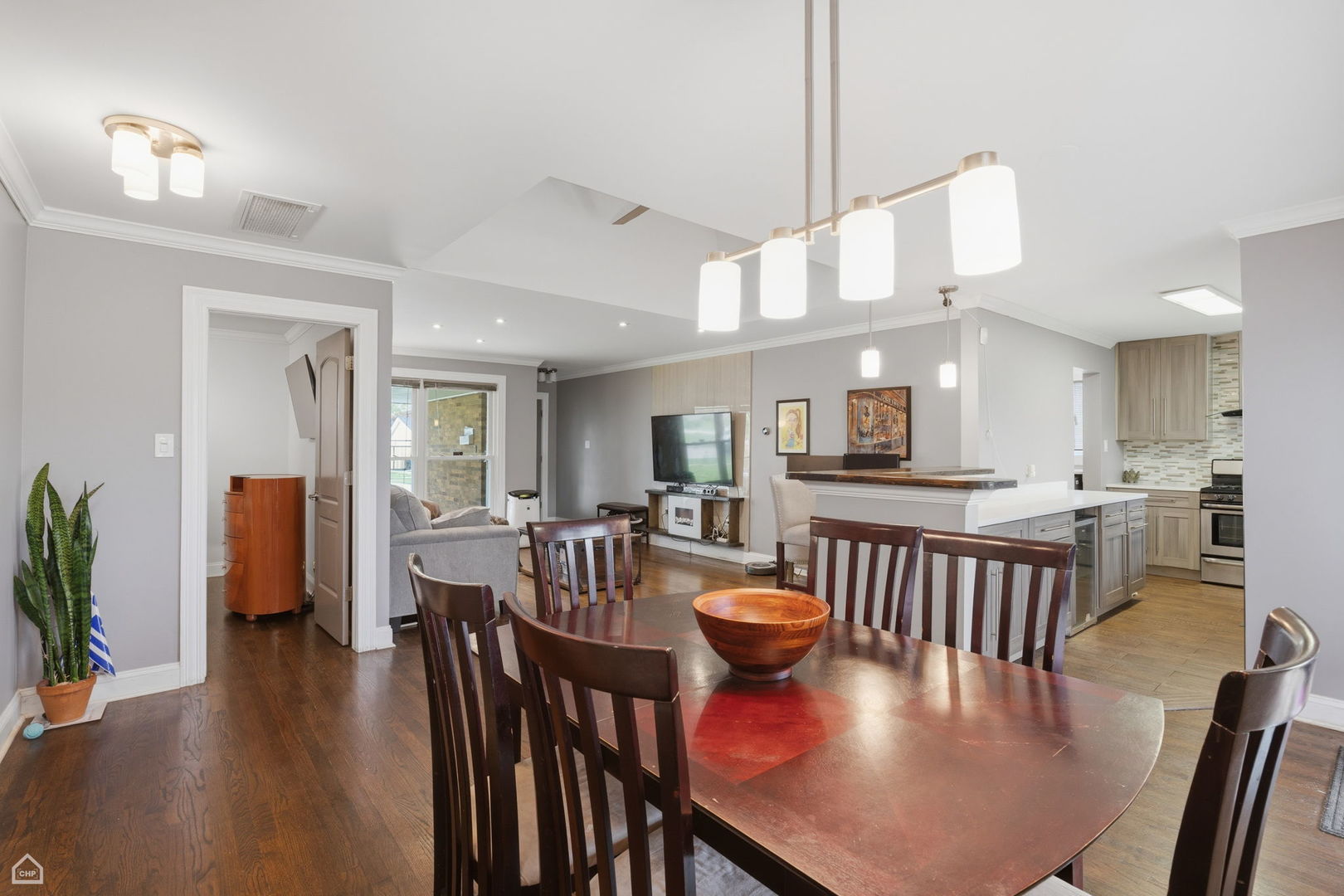7301 Davis Street Morton Grove, IL 60053 - Photo 13 of 14 a view of a dining room with furniture window and wooden floor
