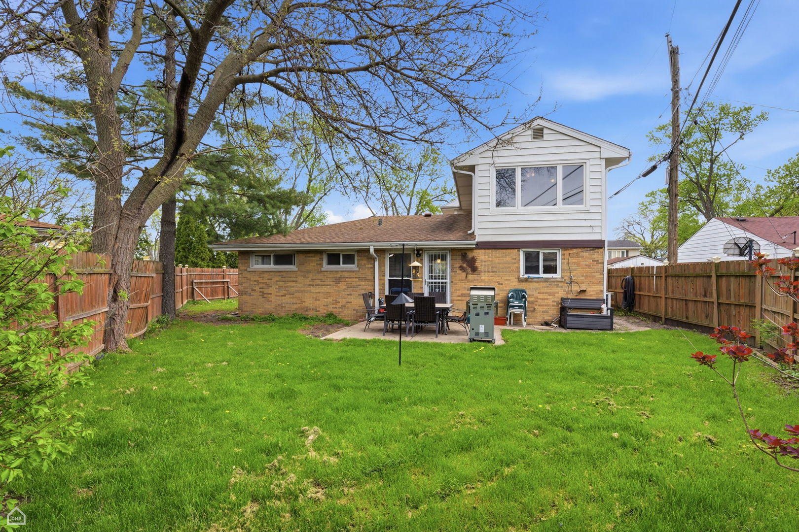 7301 Davis Street Morton Grove, IL 60053 - Photo 2 of 14 a view of a house with a yard porch and sitting area