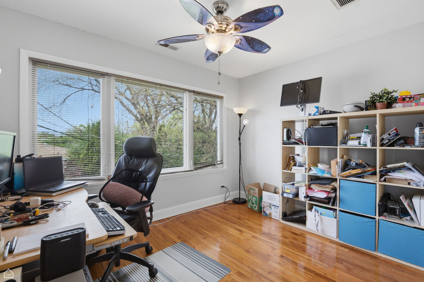 7301 Davis Street Morton Grove, IL 60053 - Photo 3 of 14 a view of a workspace with furniture and a window