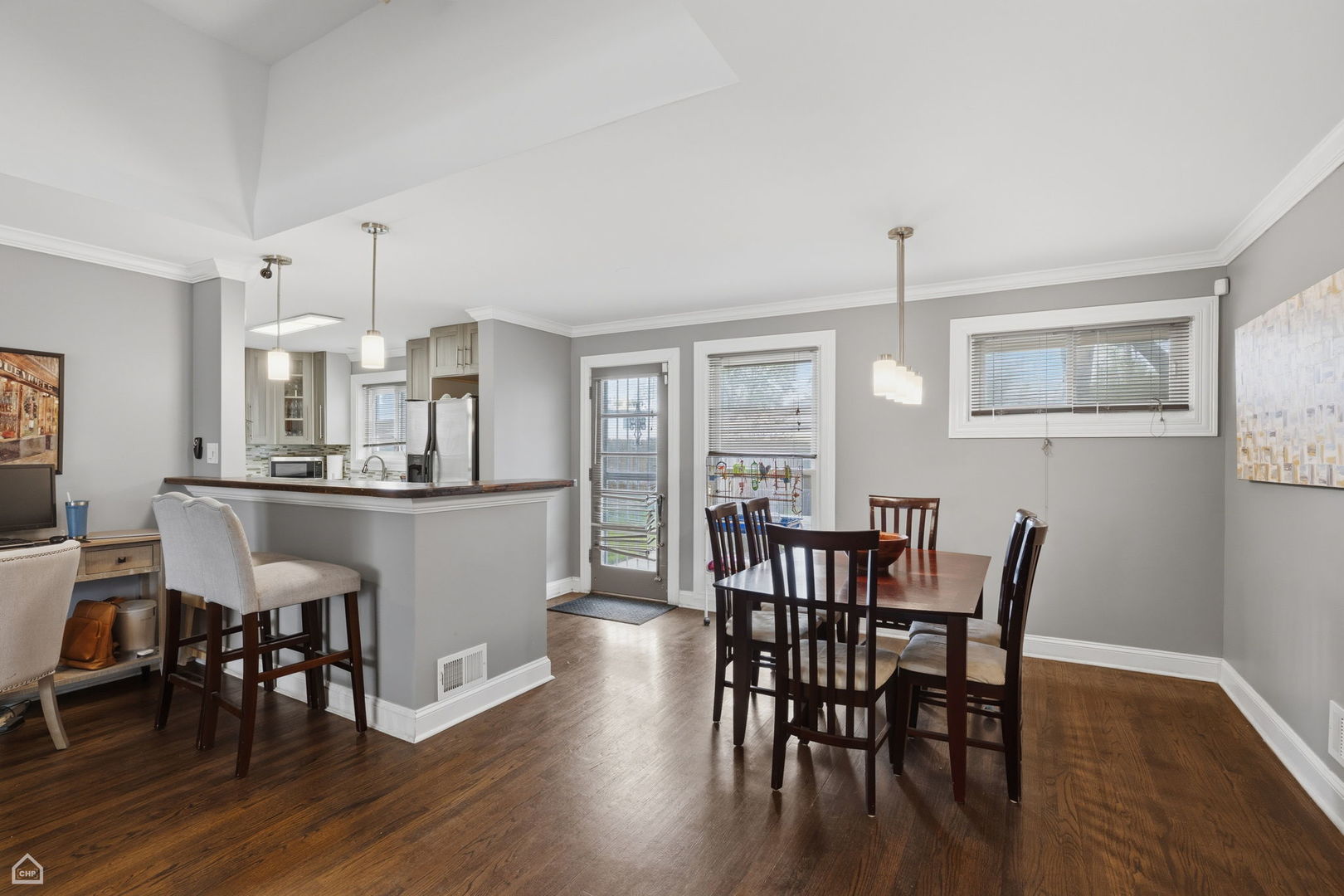 7301 Davis Street Morton Grove, IL 60053 - Photo 10 of 14 a view of a dining room with furniture and wooden floor