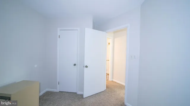 a view of hallway with closet