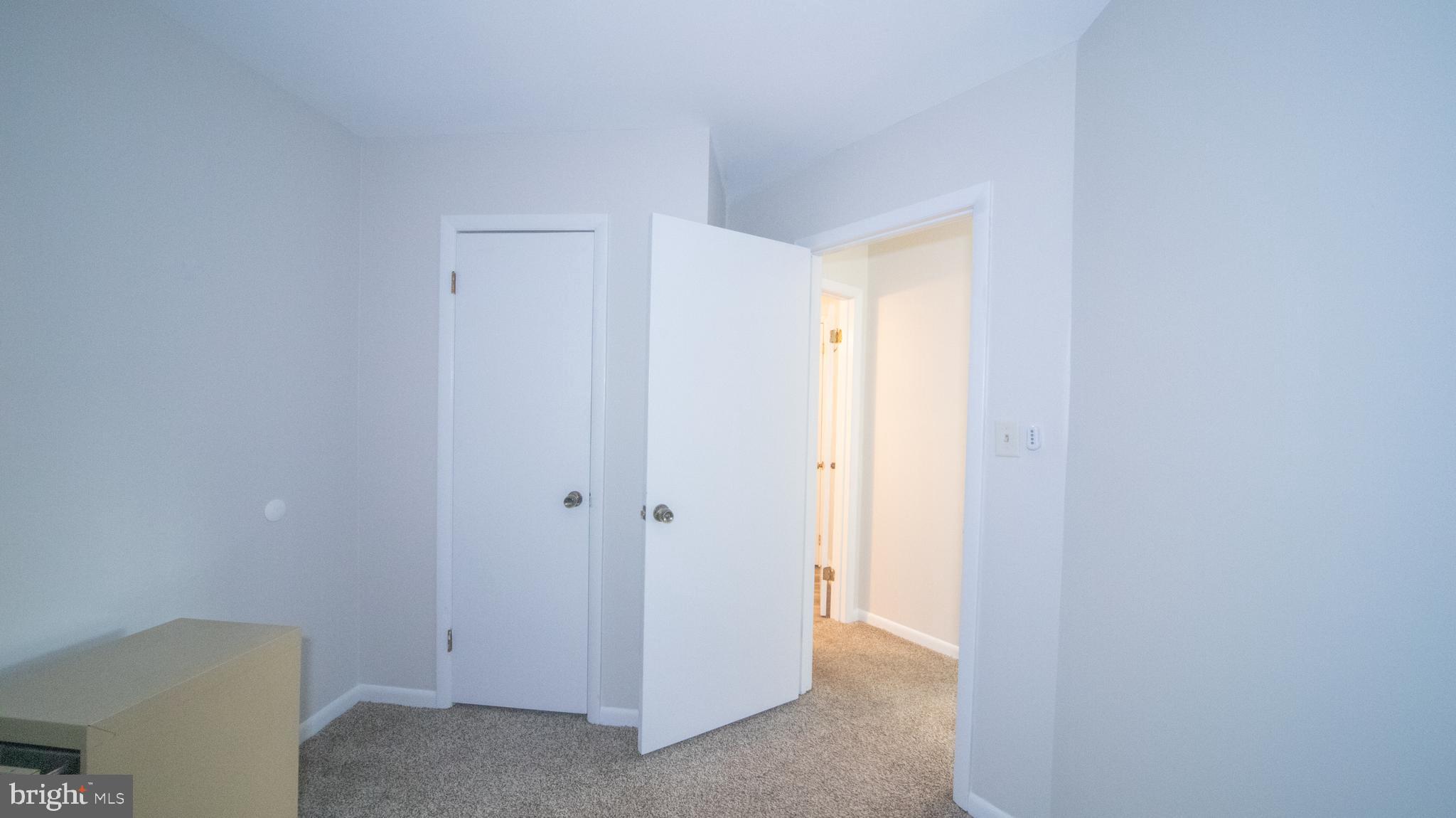 593 Riverside Drive Pasadena, MD 21122 - Photo 12 of 25 a view of hallway with closet