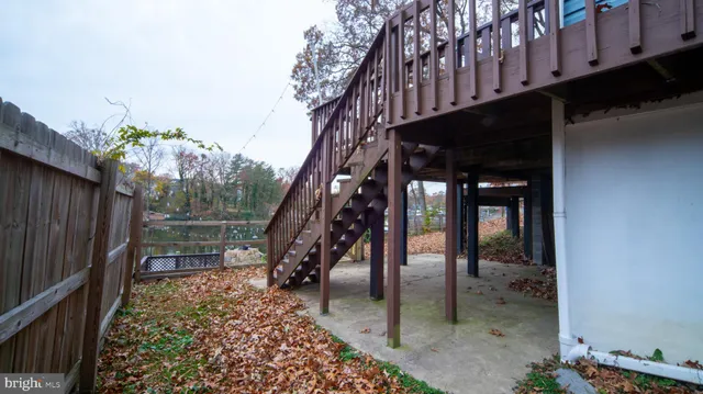 a view of a lake with a bench and lake view