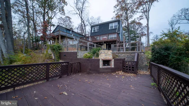 a view of a terrace with wooden floor and outdoor space