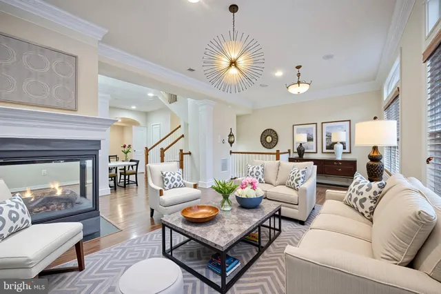 a spacious bathroom with a granite countertop tub shower and mirror