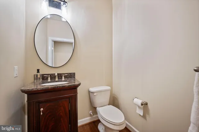 a bathroom with a toilet and a sink