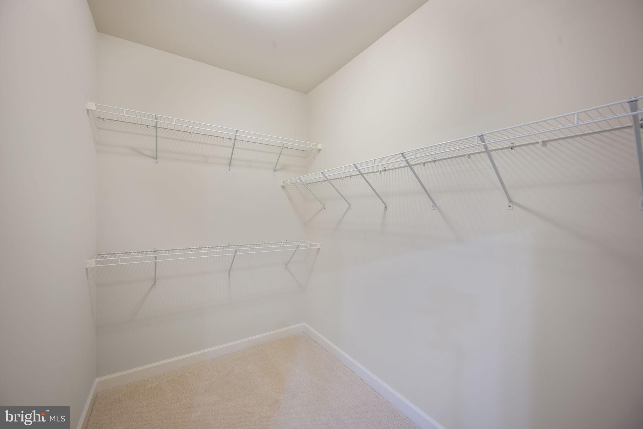 8976 Tawes Street Fulton, MD 20759 - Photo 41 of 65 a view of a room with racks on the wall