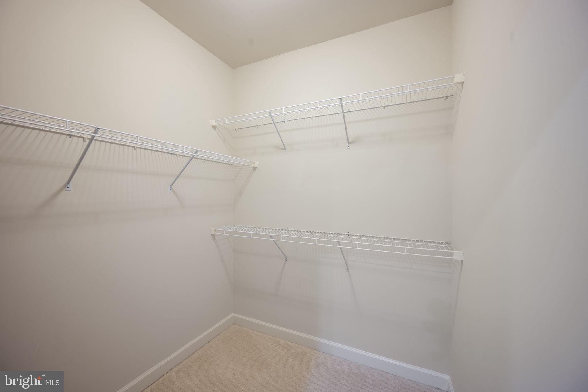 8976 Tawes Street Fulton, MD 20759 - Photo 42 of 65 a view of a room with racks on the wall