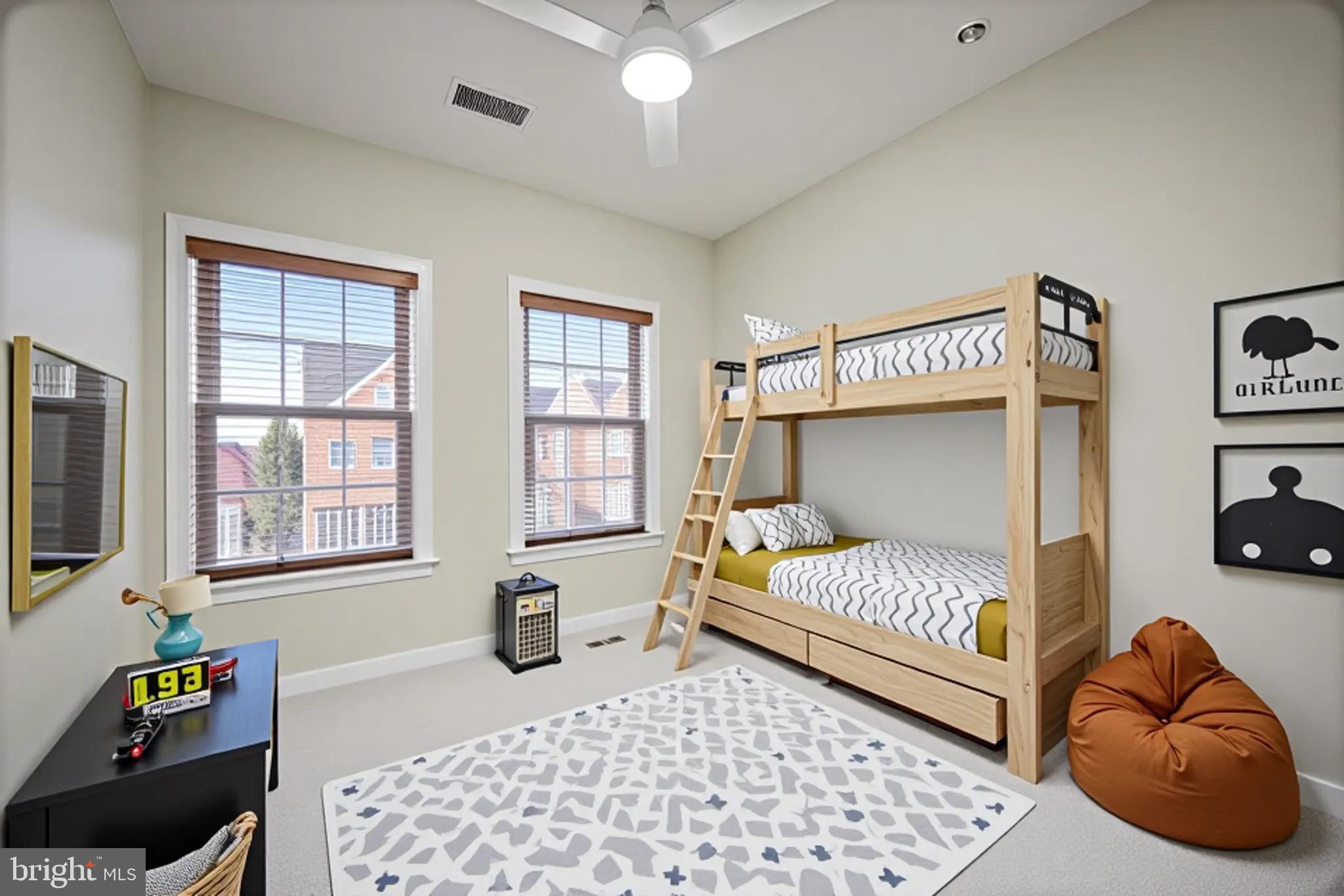 8976 Tawes Street Fulton, MD 20759 - Photo 43 of 65 a bedroom with a bed and a window