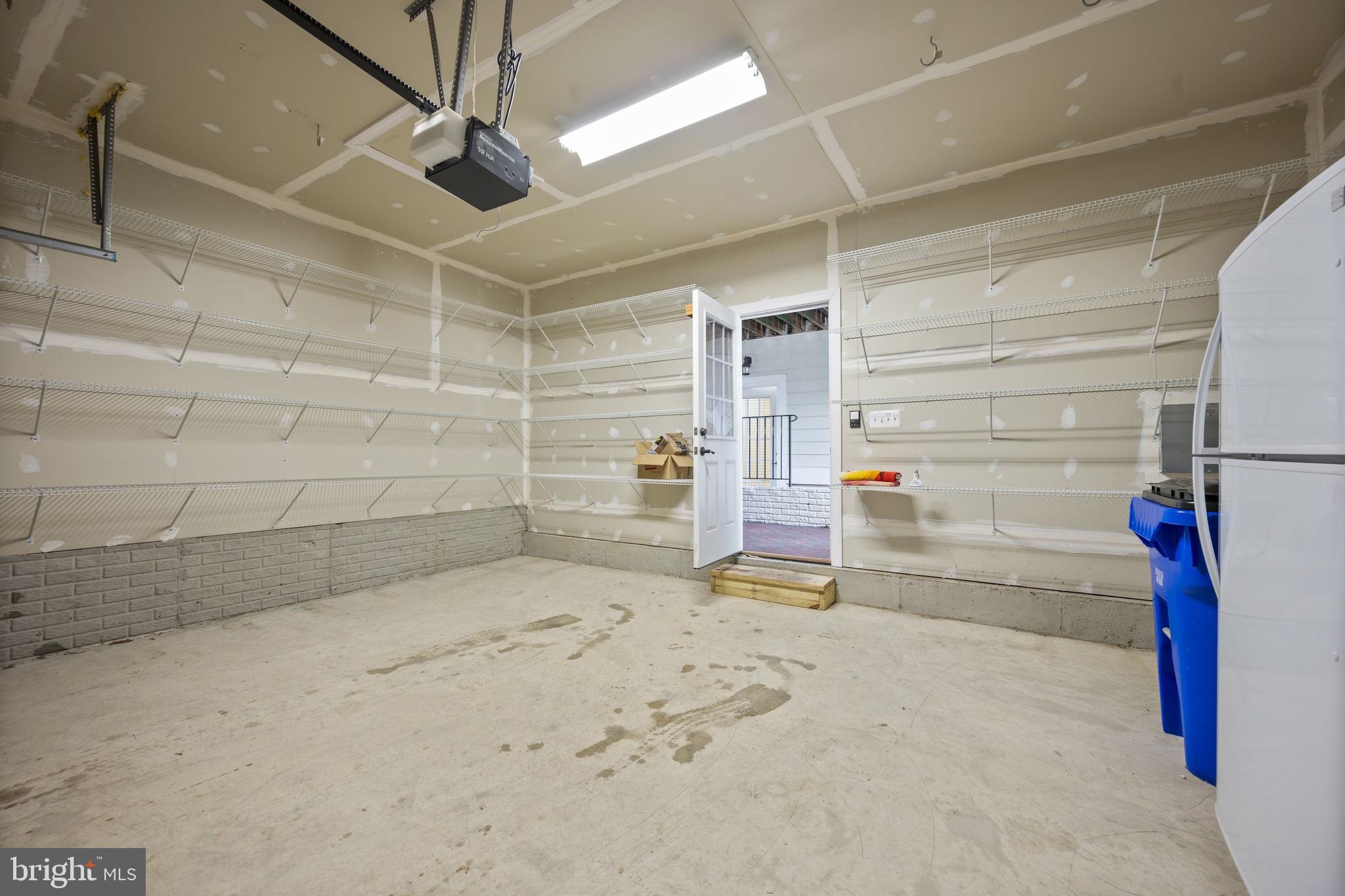 8976 Tawes Street Fulton, MD 20759 - Photo 54 of 65 2 Car Garage with Built-in Shelving