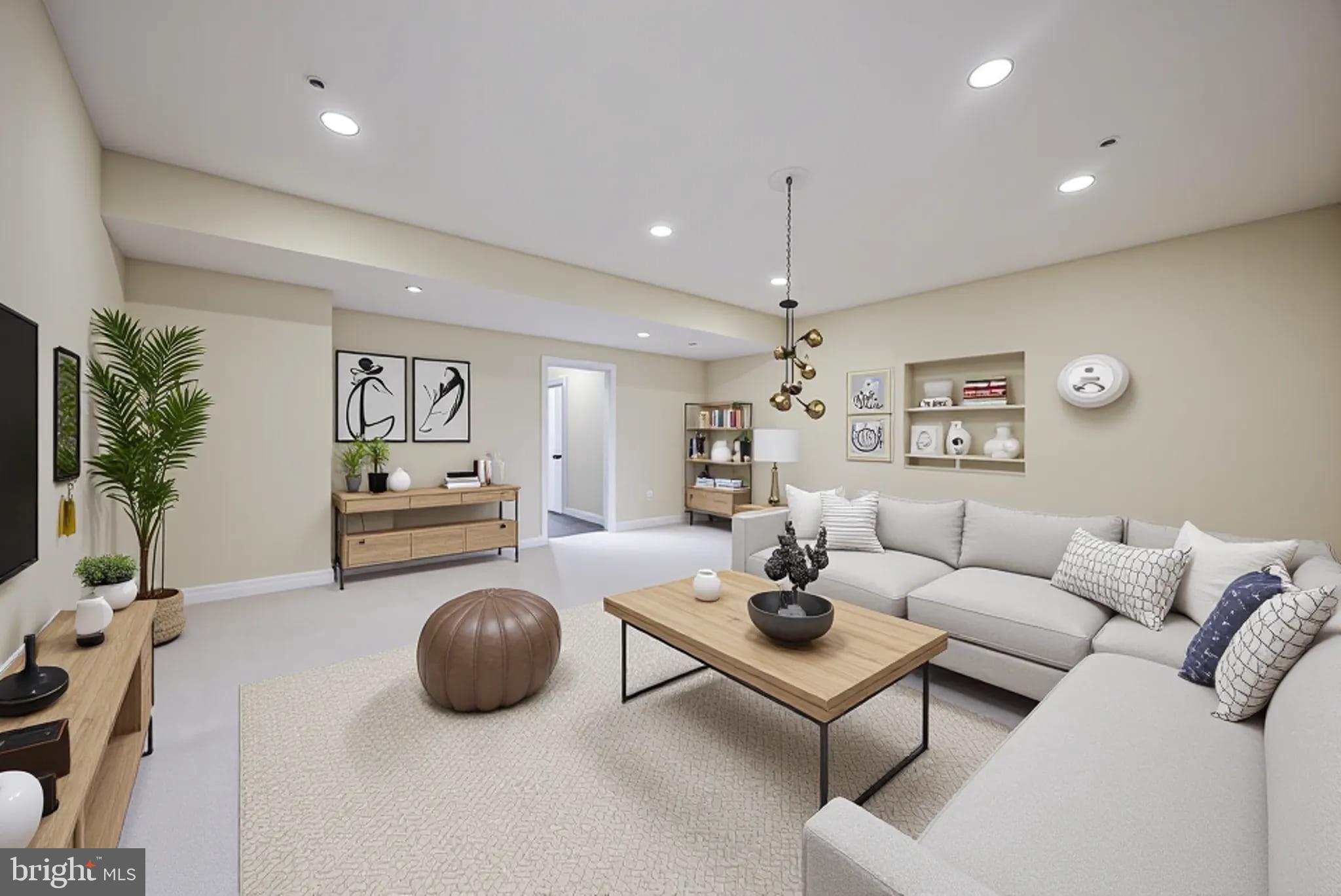 8976 Tawes Street Fulton, MD 20759 - Photo 7 of 65 a living room with furniture and a flat screen tv