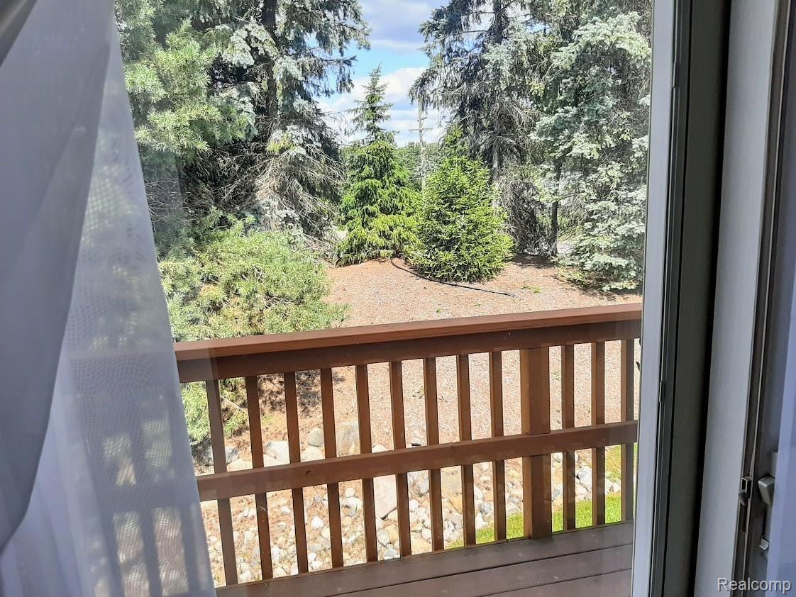 7280 Rabbit Ears Pass, Unit 41 Clarkston, MI 48346 - Photo 16 of 23 Back yard view.jpg
