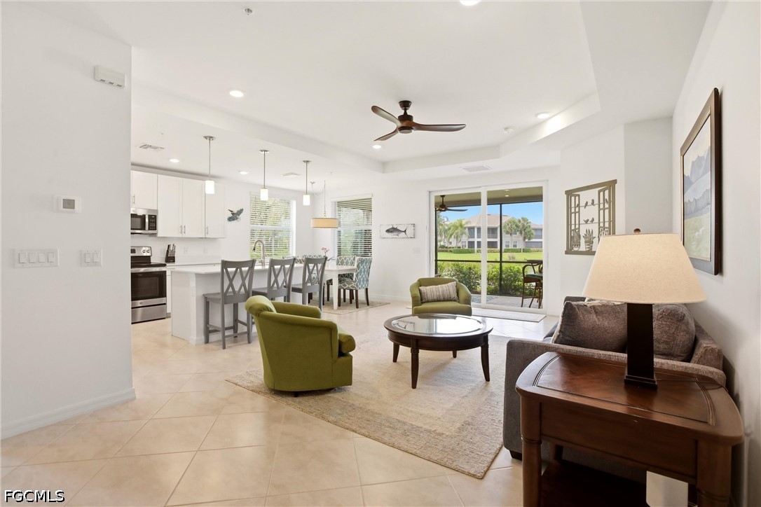 3751 Pebblebrook Ridge Court, Unit 101 Fort Myers, FL 33905 - Photo 12 of 48 a work room with furniture and a window