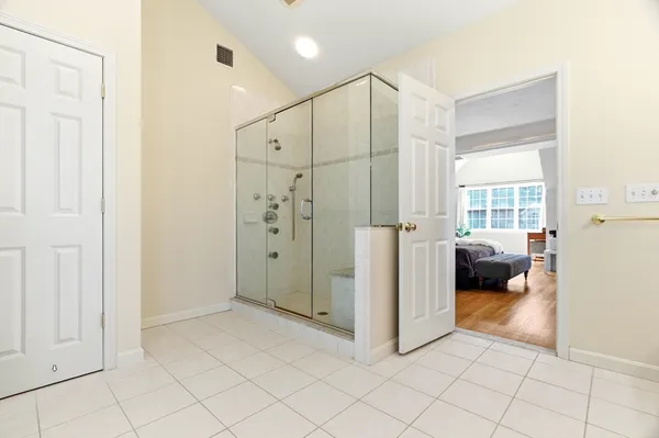 a view of a hallway with closet and entryway