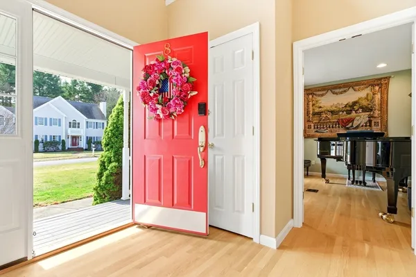 a view of front door and bedroom
