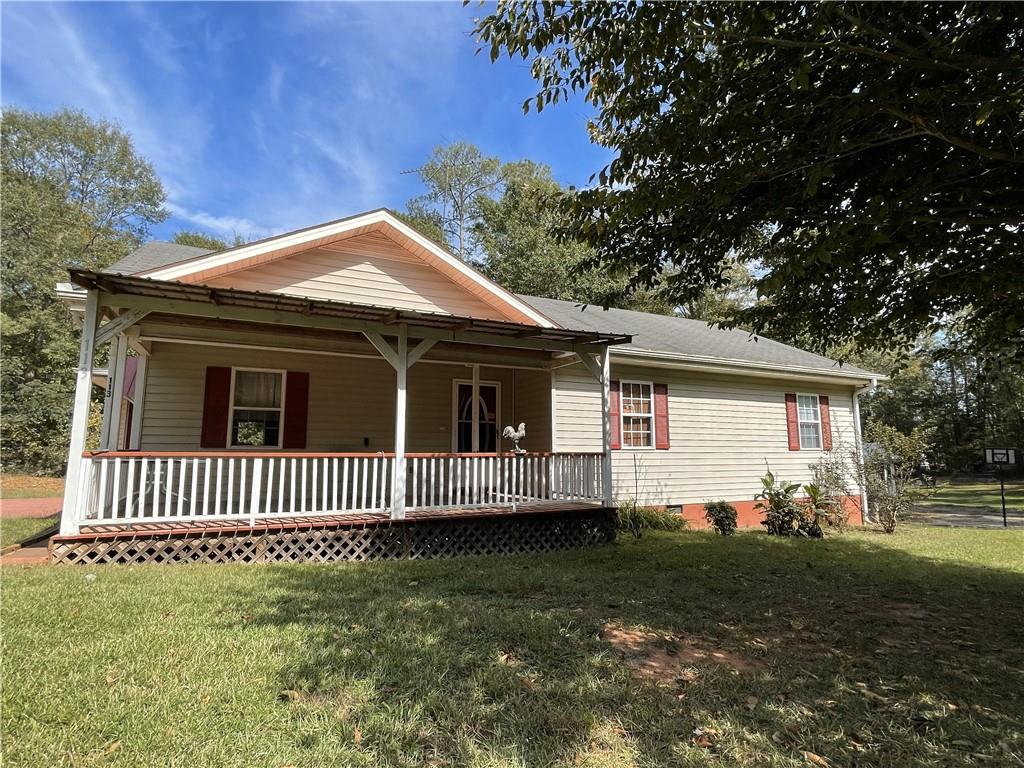 113 Bill Brown Road Jackson, GA 30233 - Photo 1 of 1 a view of a house with a yard