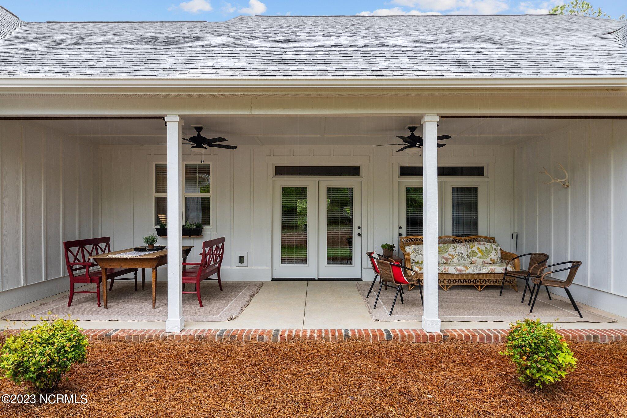 7000 Nc-22 Carthage, NC 28327 - Photo 24 of 35 Back Porch - Dining and Relaxing